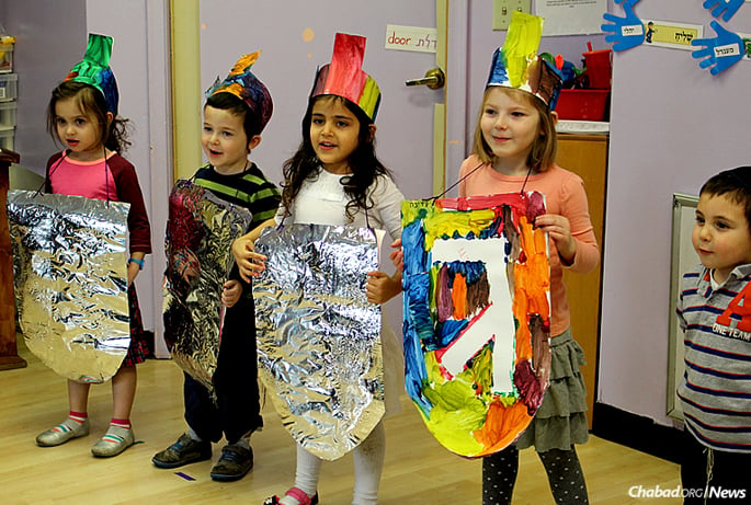 Children put on a Chanukah show at Lubavitch Cheder Day School in St. Paul, Minn. To celebrate the school’s 40th anniversary, a novel initiative is being launched this fall: free tuition the first year for new students.