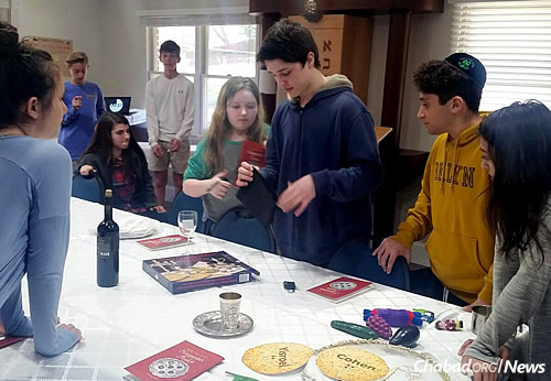 Participants need to solve clues and puzzles as a team to break out of the room and get free, a relevant theme as Passover approaches. (Photo: CKids)