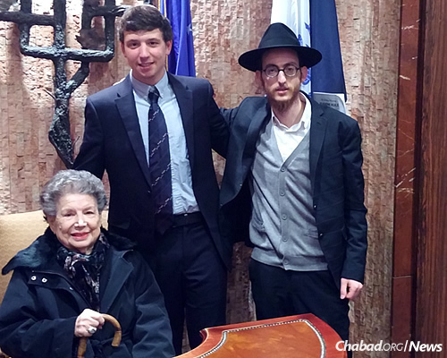 Arlene Kule, with her grandson and the rabbi, who she has known for 18 years