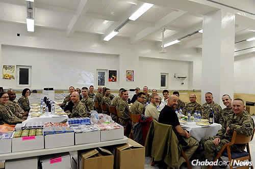 A group of military personnel before the start of the seder (Photo: The Aleph Institute)