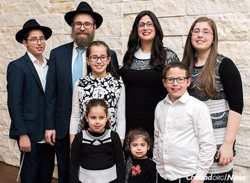 Chanie Lazaroff, with help from the whole family, accommodated more than 80 guests for dinner on the last days of Passover.