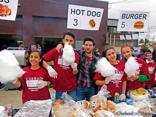 CTeen volunteers helped serve food, including hot dogs, burgers and cotton candy.