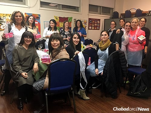Women gather for a program at the Chabad center