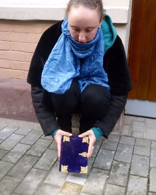 Me with Mathilde&#39;s siddur, at her stone.