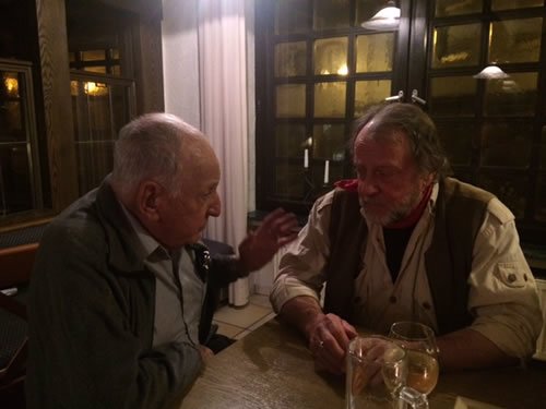My opa speaking with artist/creator of Stolpersteine, Gunter Demnig, the night before the ceremonies.