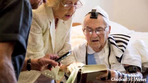 Reciting prayers in tallit and tefillin. (Photo: Tracy Glantz/The State)