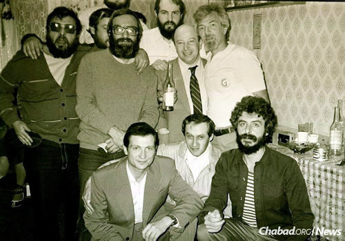 A Moscow farewell party in 1987 for Yuli Edelstein, bottom left, who after having served three years in Soviet gulags was immigrating to Israel with his family. (Photo courtesy of Association Remember and Save)