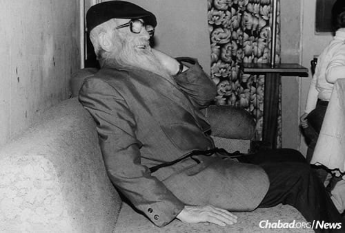 Vilensky was an old-time Lubavitcher Chassid who inspired circles of young Jewish refuseniks in Moscow. Many of his students later became teachers in their own right. Here, he watches the scene on a couch at the Kara-Ivanov’s apartment during their son&#39;s upshernin in the early 1980s. (Photo courtesy of Michael Kara-Ivanov)