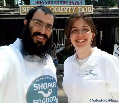 The Yusevitzes at the Nevada County fair, attracting attention with their “Shofar so good” custom T-shirts, reminding people that Rosh Hashanah is coming up.