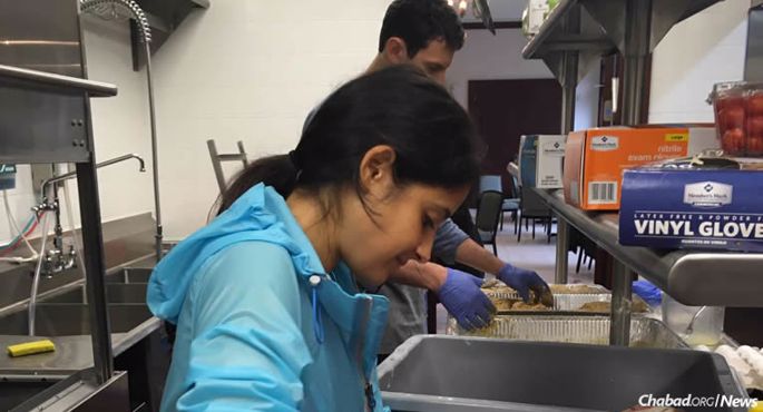 Dayna Skolkin and Josh Tillis, who postponed their wedding in Houston this week, donated and helped prepare food meant for a pre-wedding Shabbat dinner. Instead, the meals were delivered to families made homeless by Hurricane Harvey.