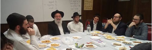 A farbrengen (Chassidic gathering) with Rabbi Brafman (center)