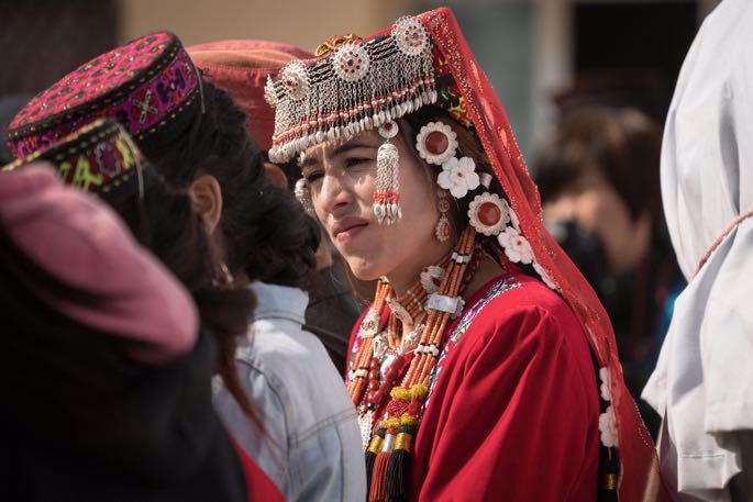 A woman wearing the traditional garb of Jewish women from Afghanistan.