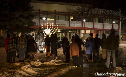 Rabbi Yonah Grossman leads the menorah-lighting in front of the Fargo Civic Center.