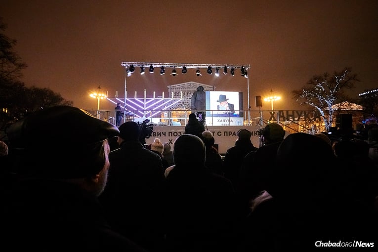 Chief Rabbi of Russia Berel Lazar leads the lighting of the Chanukah menorah and live music celebration in Revolution Square, Moscow, not far from the Kremlin, on Tuesday, Dec. 12, the first night of the eight-day holiday of Chanukah.