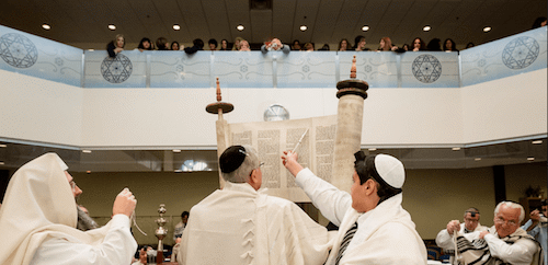 Raising the Torah, called hagbah (Credit: Serraf Studio)