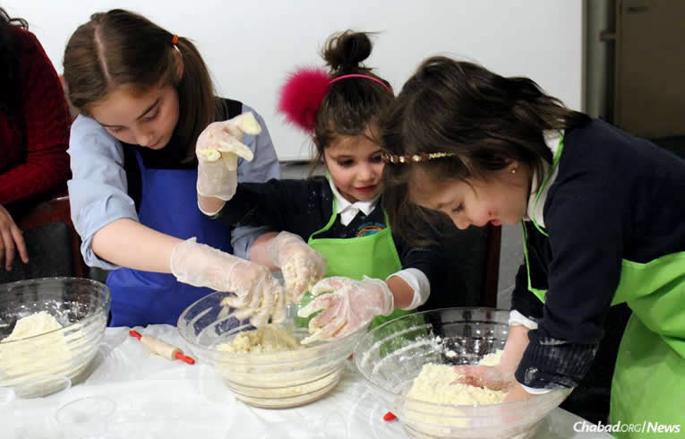 Kids cook together as part of an active and inclusive afterschool program at Friendship Circle in Brooklyn, N.Y.