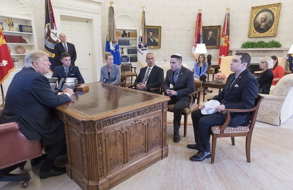 Meadow Pollack&#39;s family meeting with President Donald Trump, left, at the White House. Her brother, Hunter, says he wore a kippah to send a message that his peers should &quot;be proud to be Jewish.&quot; From left, around the desk: Brandon Schoengrund, Julie Phillips-Pollack, Andrew Pollack, Hunter Pollack and Huck Pollack. Standing by the door is White House Chief of Staff John Kelly. (Official White House Photo by Shealah Craighead)