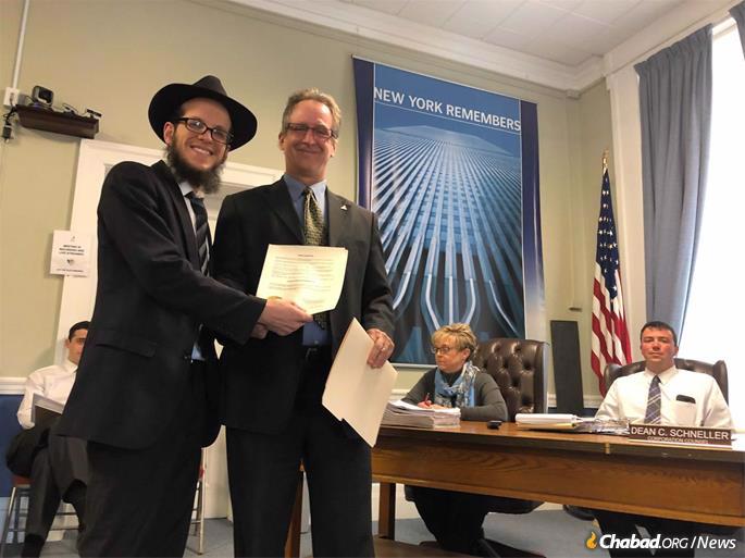 Rabbi Avrohom Rimler with Mayor Colin L. Read of Plattsburgh, N.Y.