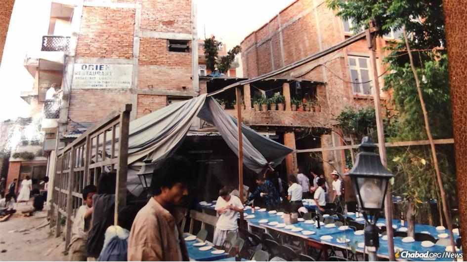 Setting up 30 years ago for the first Chabad-Lubavitch Seder in Kathmandu, Nepal. (Photo: Mendel Kastel)