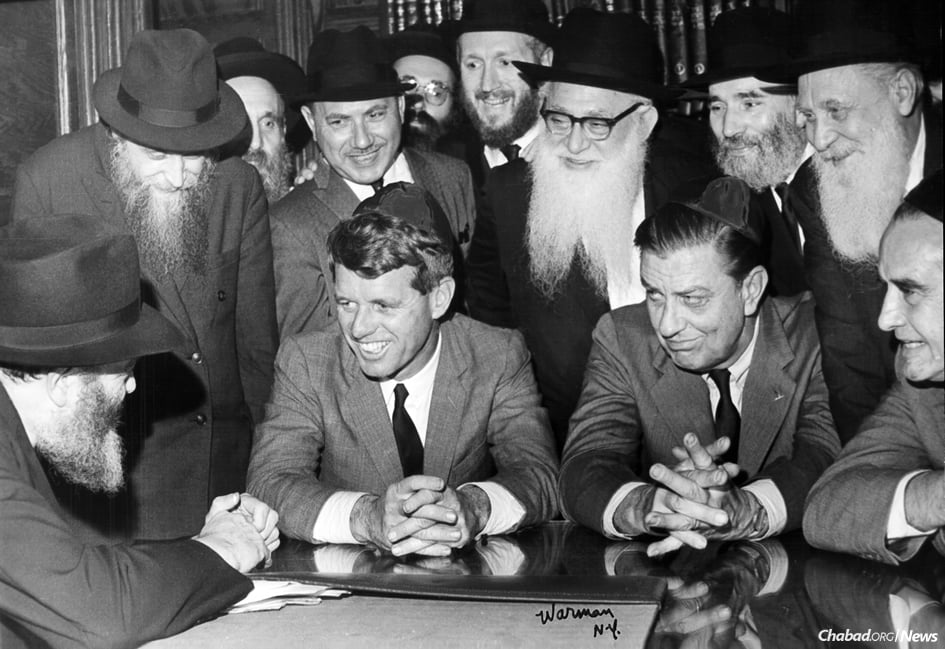 From left, seated: The Rebbe, Robert F. Kennedy, Franklin D. Roosevelt Jr. and Averell Harriman. (Photo: JEM/The Living Archive)