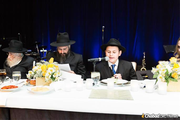 The bar mitzvah boy shares Torah learning at the celebration. (Photo: Norina Kaye)