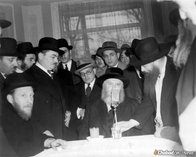 The Sixth Rebbe, Rabbi Yosef Yitzchak Schneersohn, of righteous memory, addressing a Chassidic gathering in the early 1940s in Lakewood, N.J.