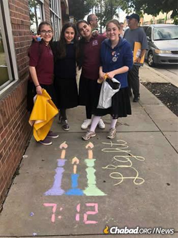 Girls at the Yeshiva have been spending extra time reaching out to their community in response, including joining the #LetsChalkShabbat project.
