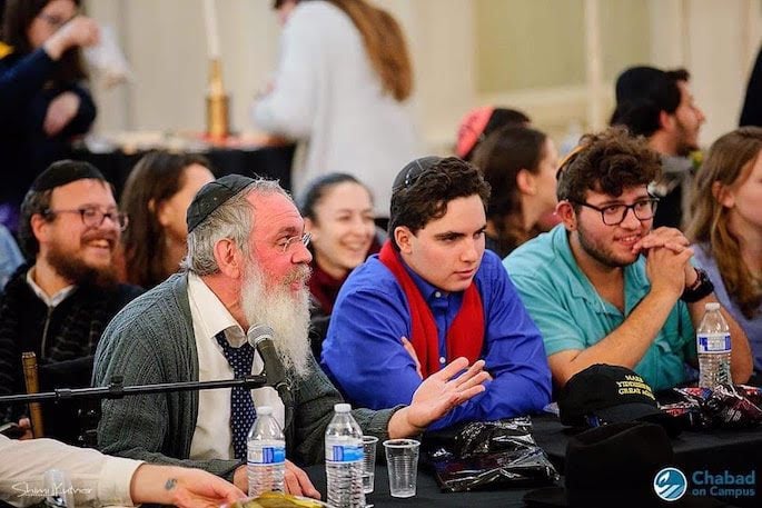 Rabbi Shmuel Posner, Shliach to Boston University, with students. (Photo: Chabad on Campus)