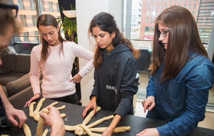 Making challah with Chabad on Campus in Amsterdam, Holland. (Photo by Bentzi Sasson)