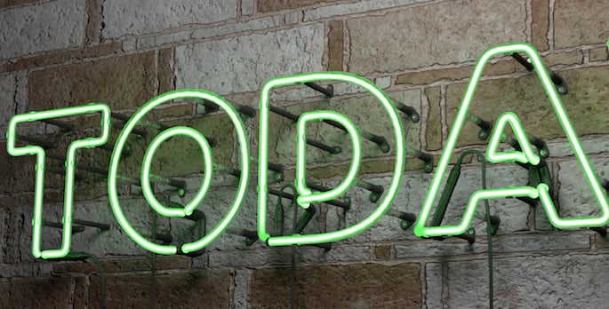 The word Toda written on a neon sign with green lights.