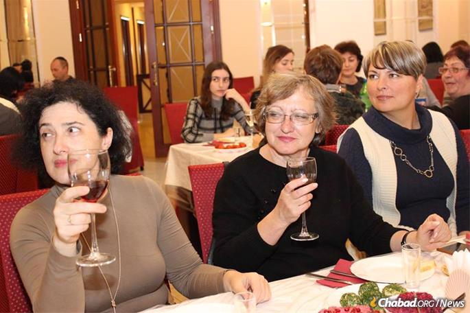 Women celebrate Yud-Tes Kislev.
