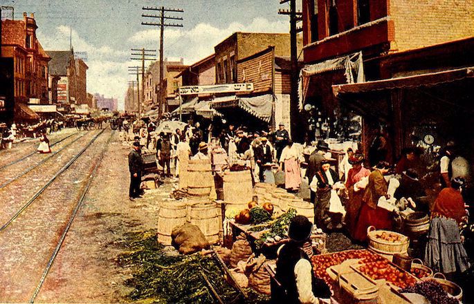 &quot;The Jewish Ghetto of Chicago,&quot; from a 1915 photo of Maxwell Street colorized and printed by V. O. Hammon Publishing Company.
