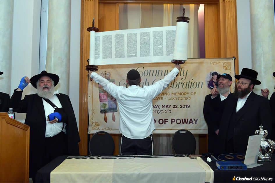 A Torah scroll was dedicated at Chabad of Poway, Calif., in memory of community member Lori Gilbert-Kaye, who was killed in the April 27 shooting.