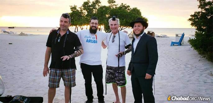 Wrapping tefillin on the beach