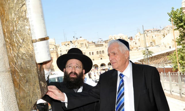 Installing the giant mezuzah near the Kotel (Photo: The Western Wall Heritage Foundation)