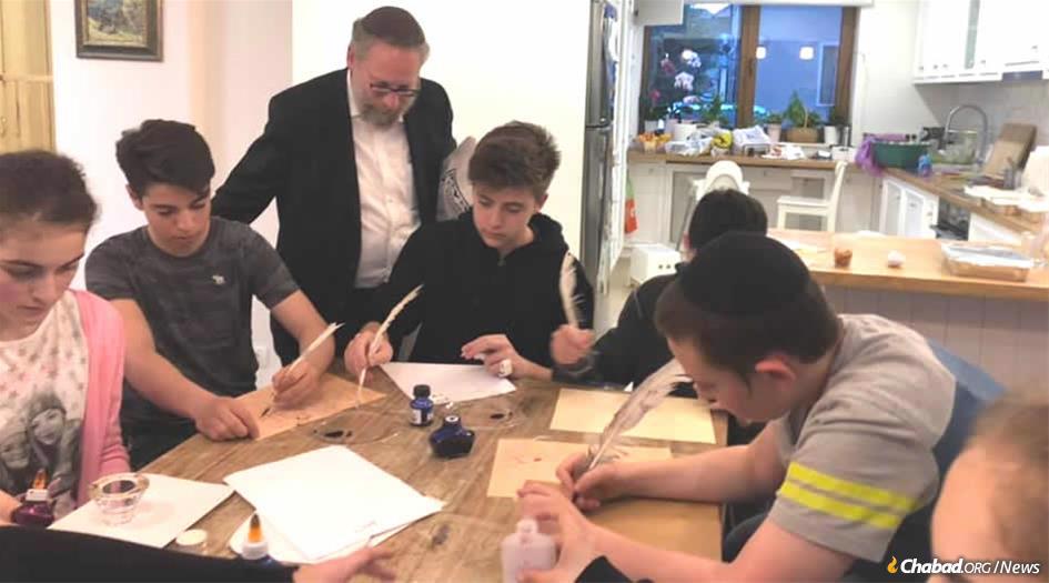 Rabbi Naftali Deutsch teaches teens in Bucharest, Romania, about Jewish scribal arts, and the beauty and depth of the Hebrew letters.