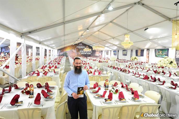 Rabbi Danny Cohen at the completion of last year's preparations for 5,000 guests. A thousand more have signed up for the meals this year.