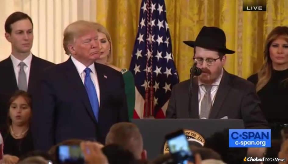 Rabbi Zvi Boyarsky, the Aleph Institute’s director of constitutional advocacy, addresses a pre-Chanukah gathering at the White House on Dec. 12 as U.S. President Donald Trump, Jared Kushner, Ivanka Trump and Melania Trump look on.