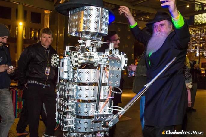 A robot helped Rabbi Yosef Langer light the Bill Graham menorah in San Francisco (File photo)
