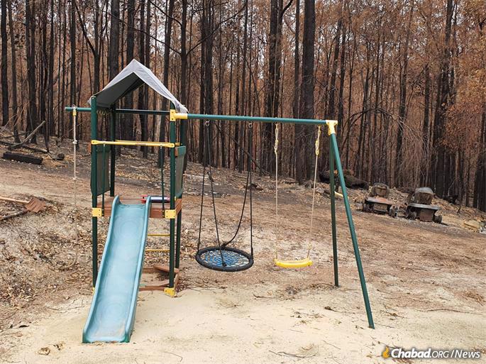 All that was left of their 25-acre property was a children&#39;s play set, which remained unscathed.