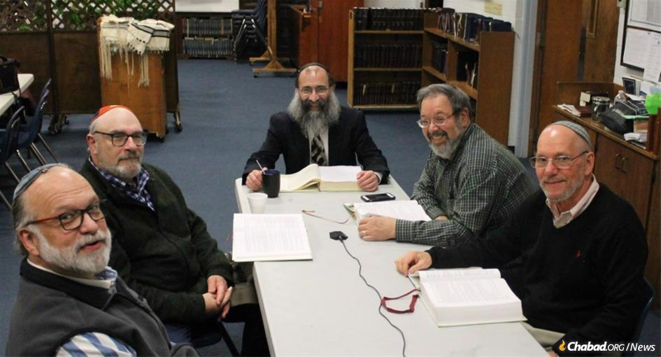 Rudy Vogel, left, with Guillermo Muhlmann, Rabbi Chaim Kosofsky, Alan Lerman, and James Smith, who completed the study of “Apples from the Orchard”—a tome of 1,117 pages of “Gleanings from the Mystical Teachings of Rabbi Yitzchak Luria (the Arizal) on the Weekly Torah Portion.”