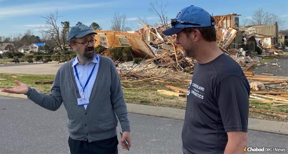 Rabbi Yitzchok Tiechtel, left, with Dr. Adam Davis of Cumberland Endodontics in Mt. Juliet, Tenn., which was severely damaged in the tornado.