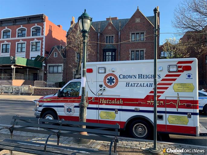 A Hatzalah volunteer ambulance recharges at one of the service's bases in front of the synagogue at 770 Eastern Parkway.