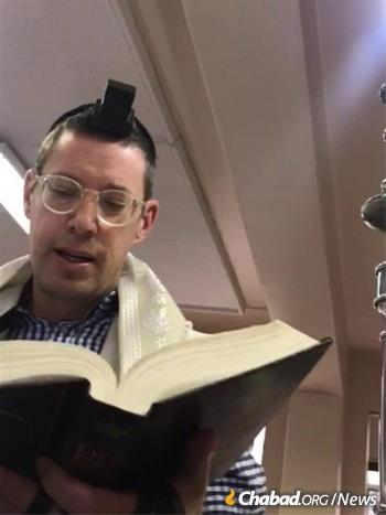 Rabbi Jonathan Fox of Johannesburg is joined by a minyan of residents at the Sandringham Gardens retirement home, which has become a baby-naming hotspot for the global Jewish community.
