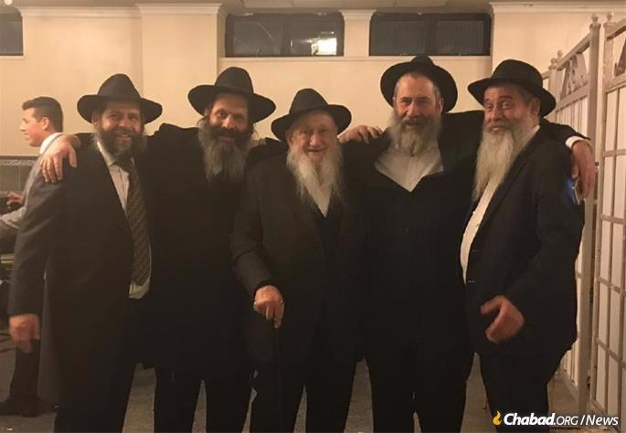 Rubashkin was known for his kindness and generosity, but most of all, for his joyous faith in G-d. He is pictured here with his four sons.