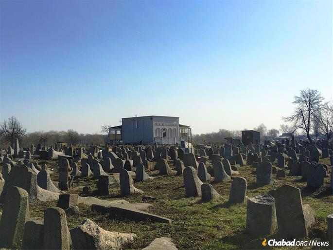 Rabbi Levi Yitzchak&#39;s gravesite (center) is located in the old Jewish cemetery of Berdichev. Thaler was installing heating under what was thought to be the floor when workers realized they had hit a brick wall. (Photo: Dovid Margolin)