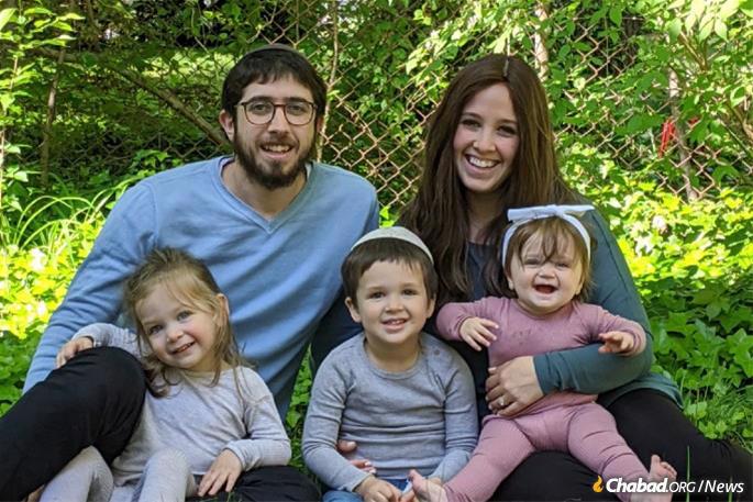 Rabbi Avremel and Shulie Vogel, directors of the Chabad center, with their children.