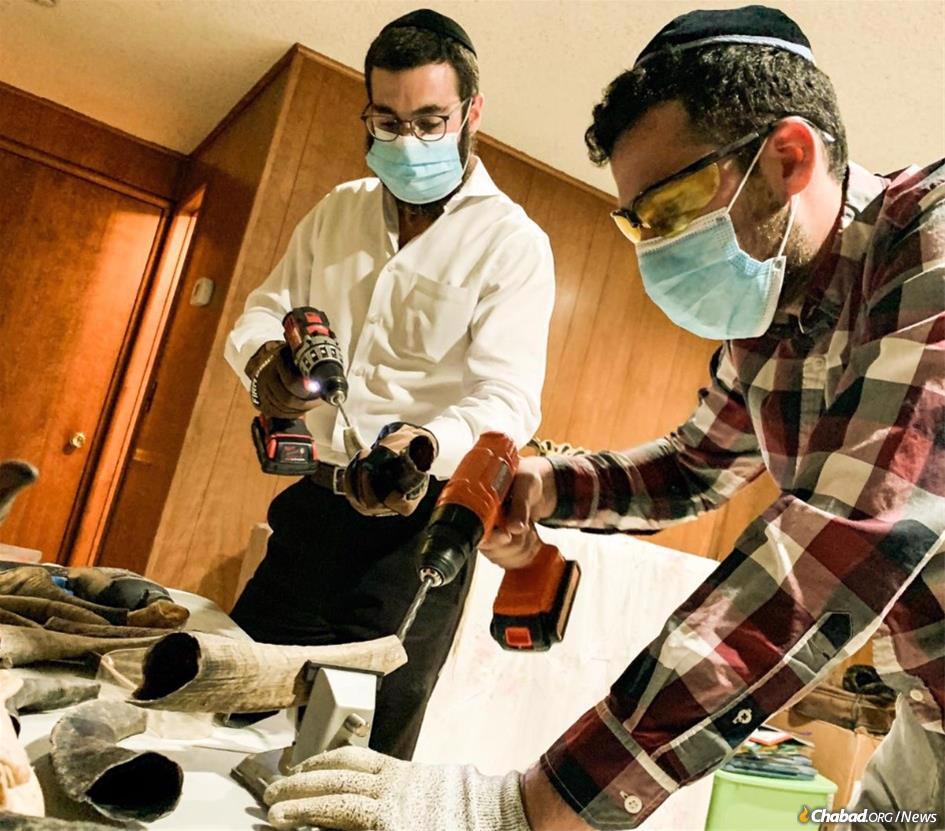 Rabbi Yehuda Ceitlin and Eli Soffer manufacture shofars from scratch to go in a “High Holiday in a Box” that Chabad of Tucson, Ariz., is distributing to community members who won’t be able to attend services this Rosh Hashanah due to the coronavirus pandemic.