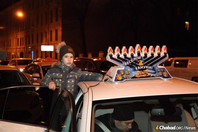 A Jewish child proudly takes part in the parade in St. Petersburg, Russia.