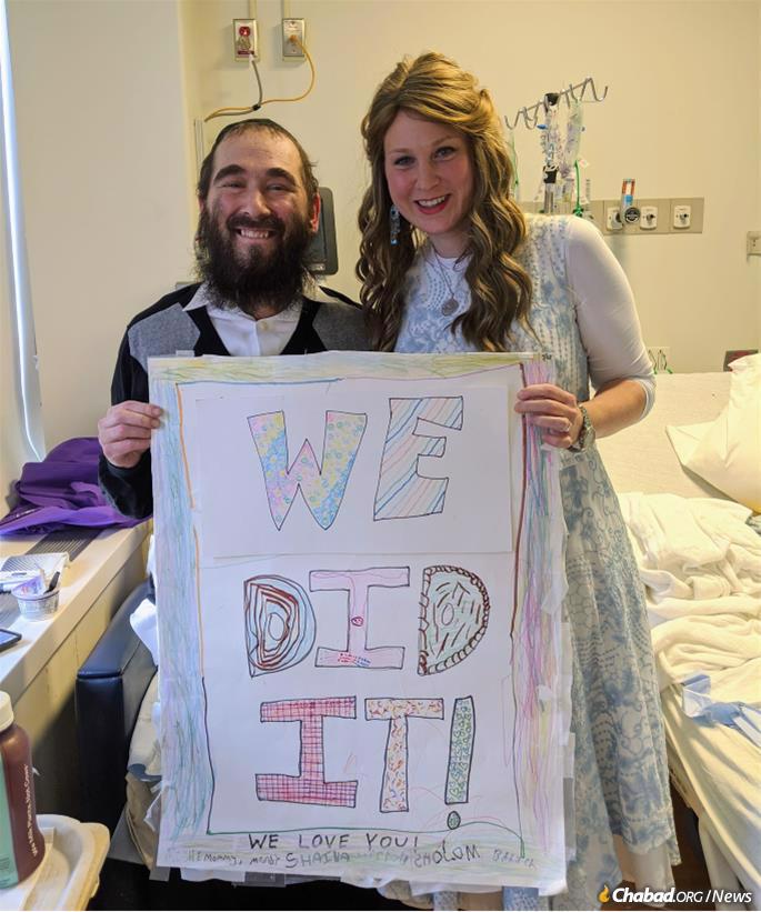 Rabbi Yehuda (“Yudi”) and Sarah Dukes as he prepared to return home.